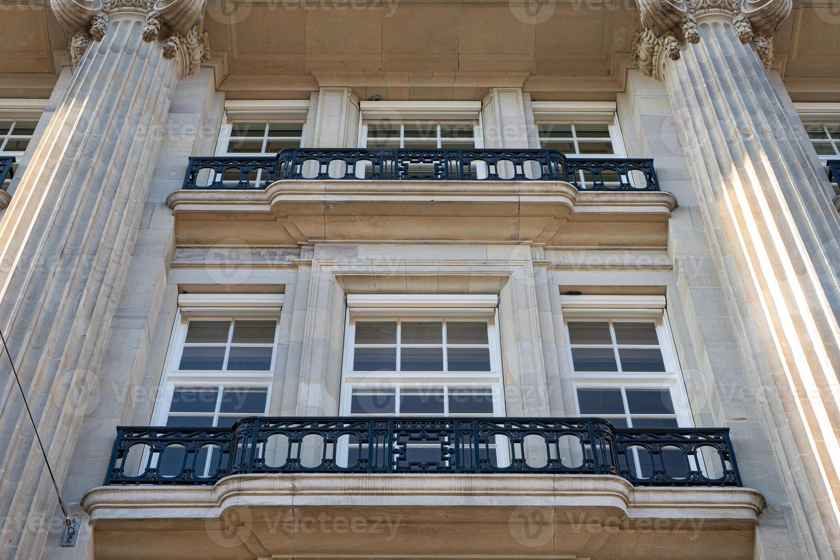 Classic building facade with columns and a clock